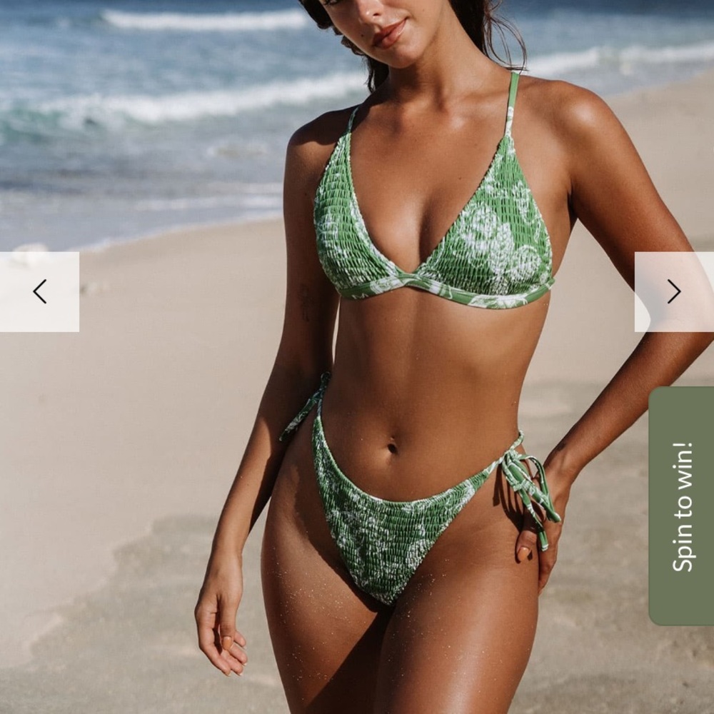 Floral shirred bikini bottoms. Never been worn or tried on! Tags attached